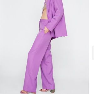 Nasty Gal purple trousers. NWT sold out online. Size medium.